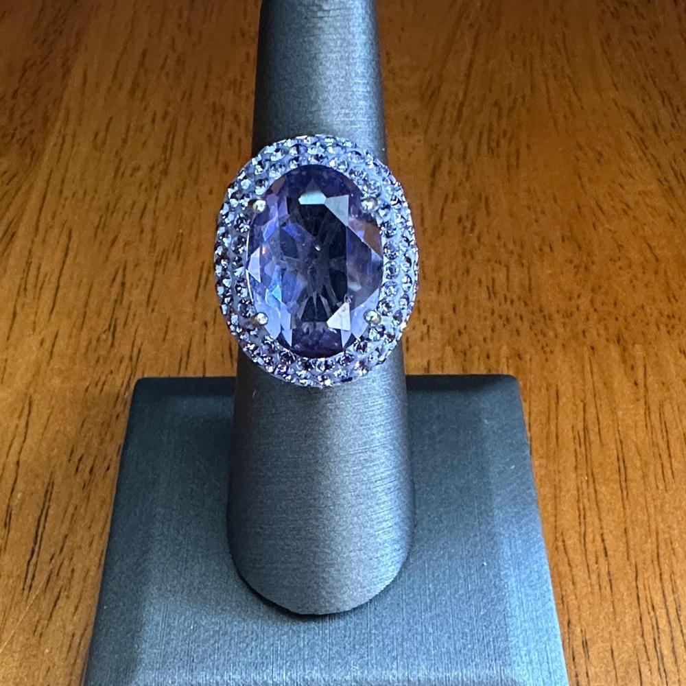 Large Purple Gemstone Ring on a 925 Silver band. The interior is beautiful. Sz 7